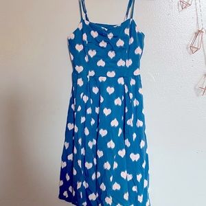 S blue tank dress with white hearts.
